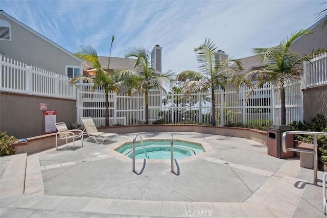 34132 Selva Rd Unit 252, Dana Point, CA 92629 - view of swimming pool featuring a hot tub and a patio area