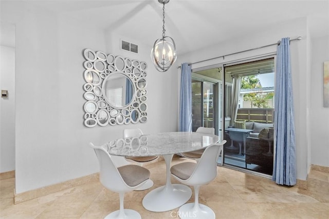34132 Selva Rd Unit 252, Dana Point, CA 92629 - dining space with a chandelier and baseboards