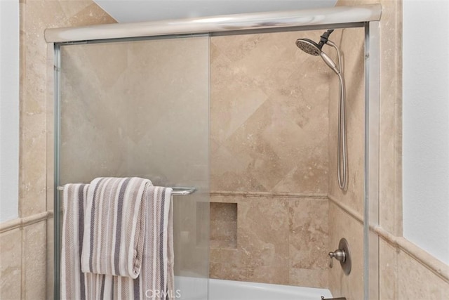 34132 Selva Rd Unit 252, Dana Point, CA 92629 - bathroom featuring combined bath / shower with glass door
