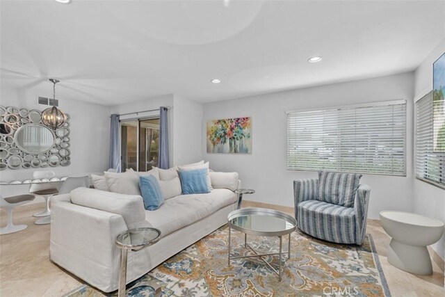 34132 Selva Rd Unit 252, Dana Point, CA 92629 - living room with recessed lighting and a chandelier