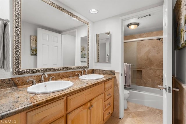 34132 Selva Rd Unit 252, Dana Point, CA 92629 - full bath featuring toilet, double vanity, bath / shower combo with glass door, recessed lighting, and tile patterned flooring