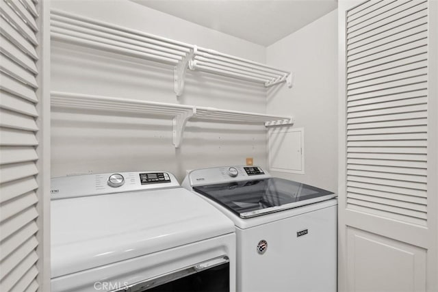 34132 Selva Rd Unit 252, Dana Point, CA 92629 - washroom with washing machine and dryer