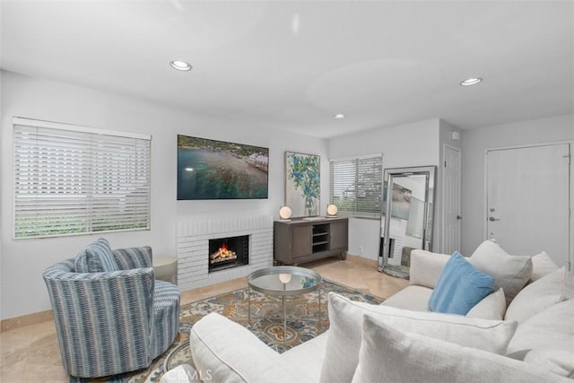 34132 Selva Rd Unit 252, Dana Point, CA 92629 - living room featuring recessed lighting, baseboards, a fireplace, and tile patterned floors