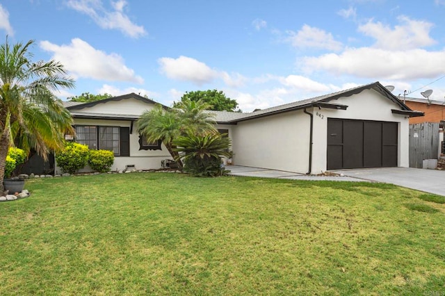 642 Carlsbad St, Spring Valley, CA 91977 - single story home with driveway, an attached garage, stucco siding, and a front lawn