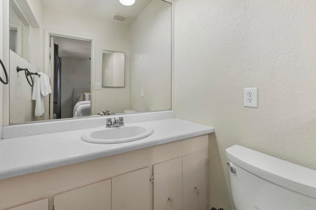 642 Carlsbad St, Spring Valley, CA 91977 - ensuite bathroom with vanity and toilet