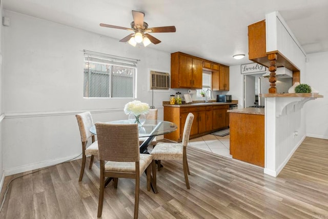 642 Carlsbad St, Spring Valley, CA 91977 - dining space with light wood finished floors, plenty of natural light, baseboards, and ceiling fan