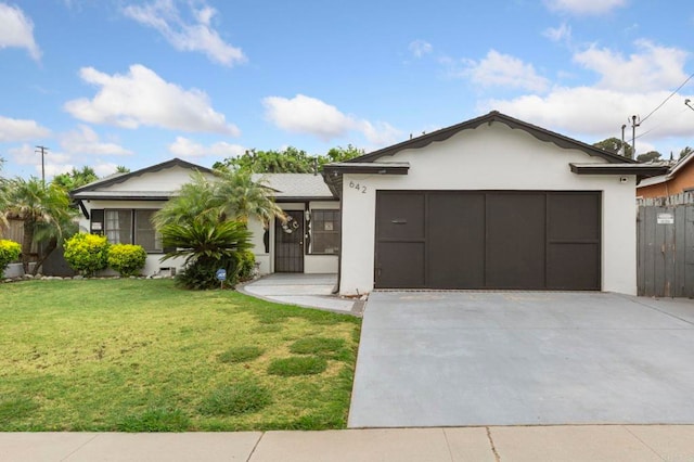 642 Carlsbad St, Spring Valley, CA 91977 - view of front of home featuring concrete driveway, an attached garage, and stucco siding