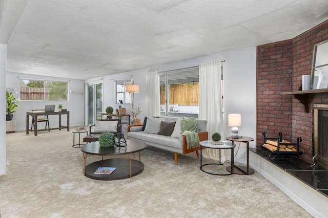 642 Carlsbad St, Spring Valley, CA 91977 - living room featuring a textured ceiling, carpet, and a brick fireplace