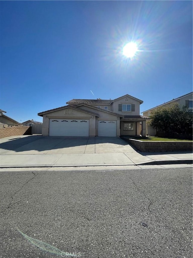 37000 Sabal Ave, Palmdale, CA 93552 - traditional home featuring driveway, a garage, and stucco siding