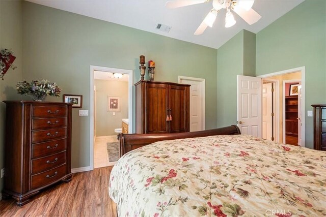 2860 Cathedral Ln, Arroyo Grande, CA 93420 - bedroom featuring high vaulted ceiling, wood finished floors, baseboards, ensuite bathroom, and ceiling fan