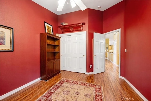 2860 Cathedral Ln, Arroyo Grande, CA 93420 - unfurnished bedroom with wood finished floors, baseboards, and a ceiling fan