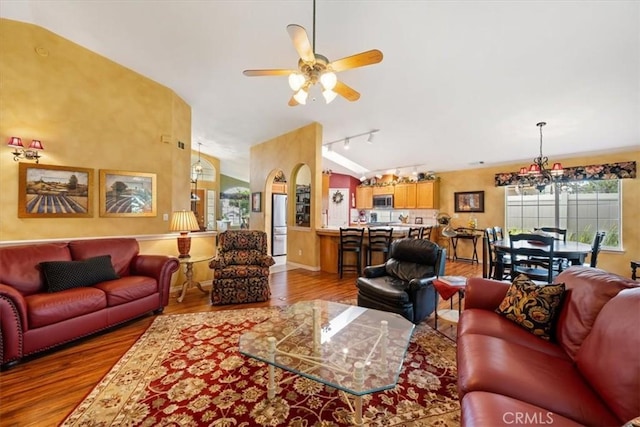 2860 Cathedral Ln, Arroyo Grande, CA 93420 - living room with wood finished floors, ceiling fan, track lighting, and vaulted ceiling