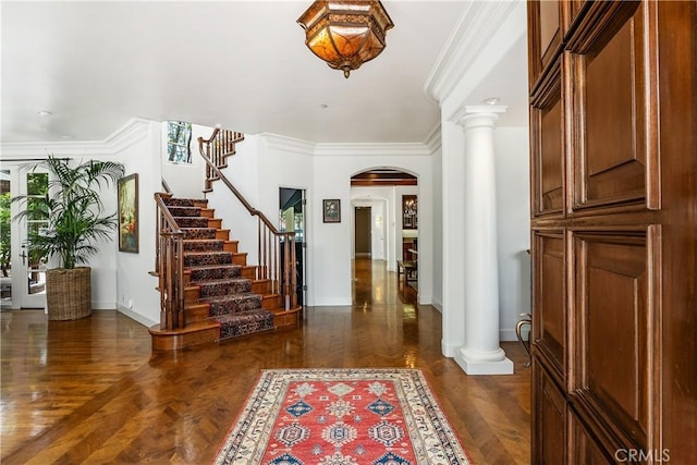 401 Piazza Lido, Newport Beach, CA 92663 - foyer entrance with arched walkways, ornate columns, stairway, baseboards, and ornamental molding