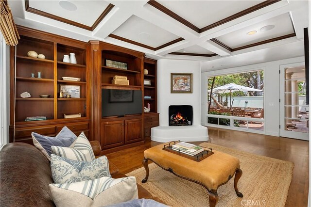 401 Piazza Lido, Newport Beach, CA 92663 - living room with wood finished floors, a warm lit fireplace, beamed ceiling, coffered ceiling, and crown molding