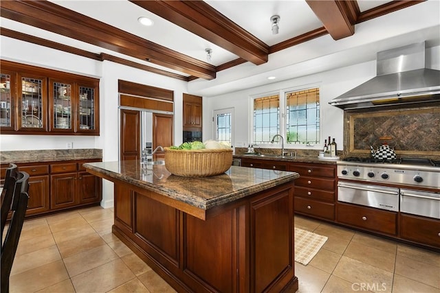 401 Piazza Lido, Newport Beach, CA 92663 - kitchen featuring wall chimney exhaust hood, a sink, beam ceiling, a kitchen island, and backsplash