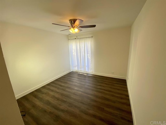745 E Bradley Ave Unit 27, El Cajon, CA 92021 - spare room featuring baseboards, ceiling fan, and dark wood-type flooring