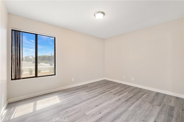 27505 Ventura Dr, Cathedral City, CA 92234 - spare room with wood finished floors and baseboards