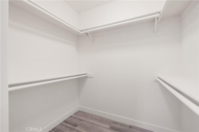 27505 Ventura Dr, Cathedral City, CA 92234 - walk in closet with wood finished floors