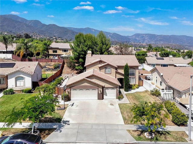 3506 Belvedere Way, Corona, CA 92882 - view of front facade featuring a residential view, concrete driveway, a mountain view, and a tile roof