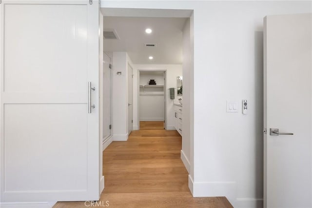 13621 Fairmont Way, Tustin, CA 92780 - hall featuring light wood-style flooring, recessed lighting, and baseboards