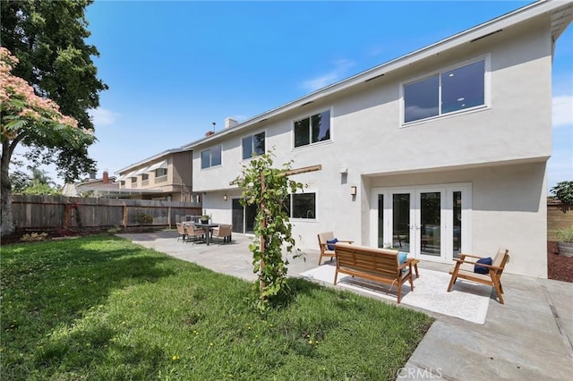 13621 Fairmont Way, Tustin, CA 92780 - rear view of house featuring stucco siding, a patio area, and french doors