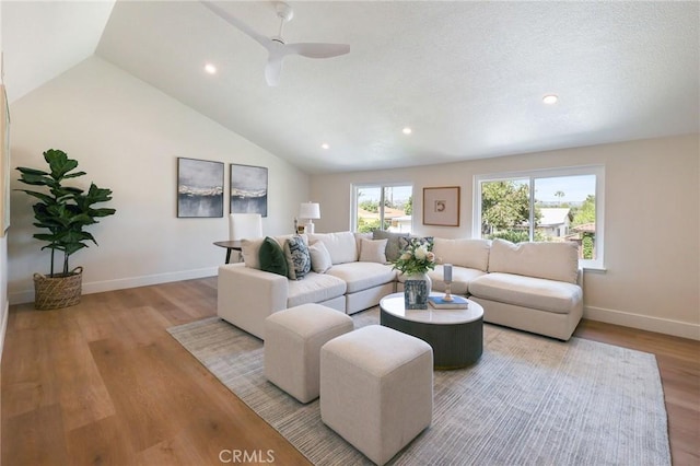 13621 Fairmont Way, Tustin, CA 92780 - living room with vaulted ceiling, wood finished floors, baseboards, recessed lighting, and ceiling fan