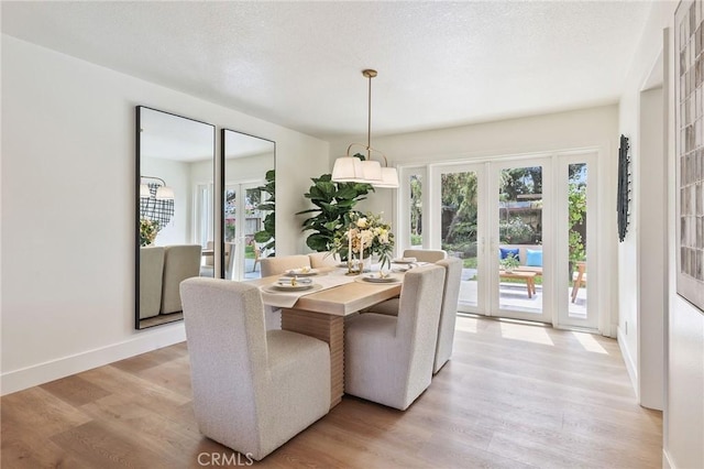 13621 Fairmont Way, Tustin, CA 92780 - dining space featuring light wood-type flooring and baseboards