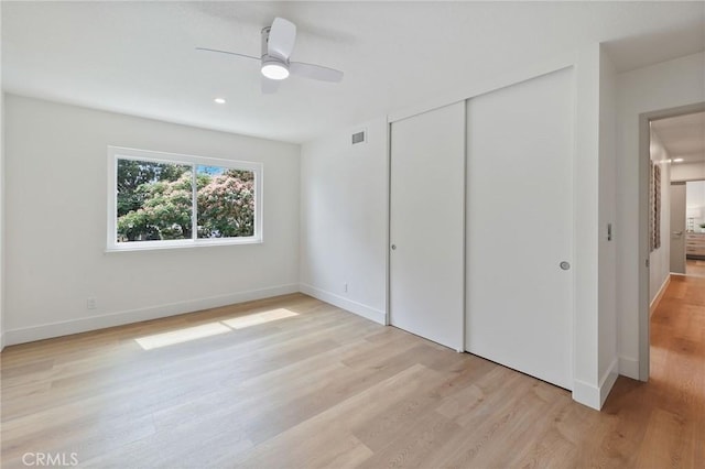 13621 Fairmont Way, Tustin, CA 92780 - unfurnished bedroom with light wood finished floors, a closet, baseboards, and a ceiling fan
