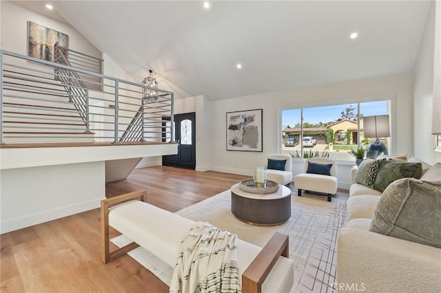 13621 Fairmont Way, Tustin, CA 92780 - living room with healthy amount of natural light, baseboards, stairway, wood finished floors, and recessed lighting