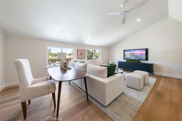 13621 Fairmont Way, Tustin, CA 92780 - living area featuring vaulted ceiling, light wood-type flooring, recessed lighting, baseboards, and a ceiling fan