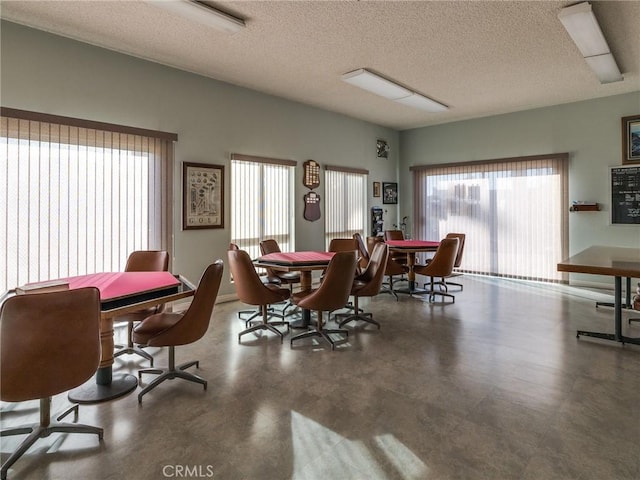 22652 Nadine Cir Unit A, Torrance, CA 90505 - dining room featuring a textured ceiling and finished concrete flooring