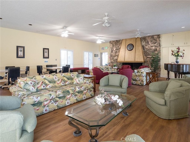 22652 Nadine Cir Unit A, Torrance, CA 90505 - living area featuring a textured ceiling, wood finished floors, and ceiling fan