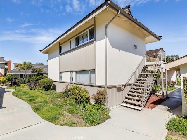 22652 Nadine Cir Unit A, Torrance, CA 90505 - view of side of home with stairway and stucco siding