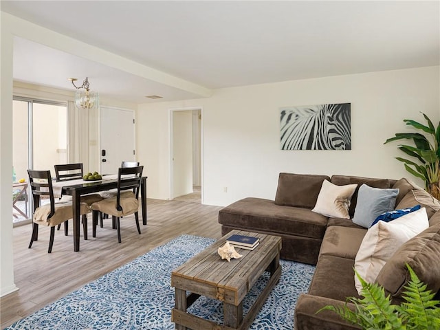 22652 Nadine Cir Unit A, Torrance, CA 90505 - living room with a chandelier and light wood-type flooring
