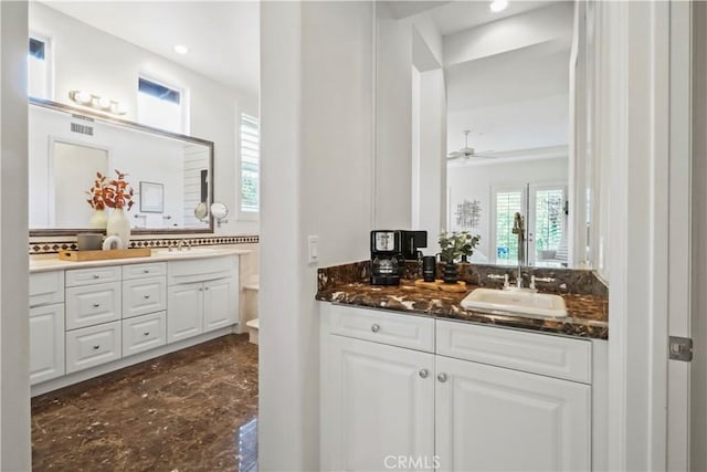 12165 Ojeda Ct, Tustin, CA 92782 - bathroom featuring vanity, marble finish flooring, recessed lighting, and toilet