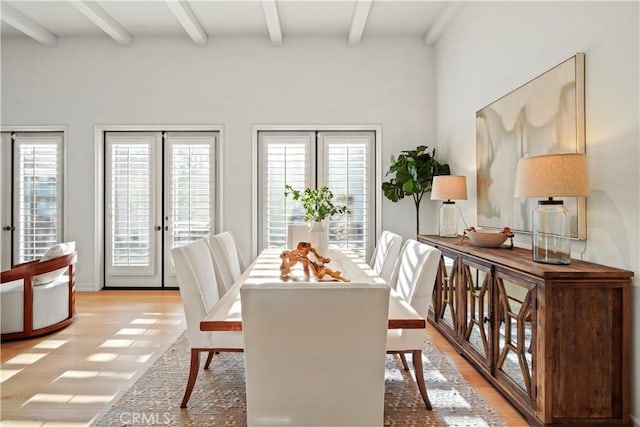 12165 Ojeda Ct, Tustin, CA 92782 - dining room with french doors, beamed ceiling, and healthy amount of natural light