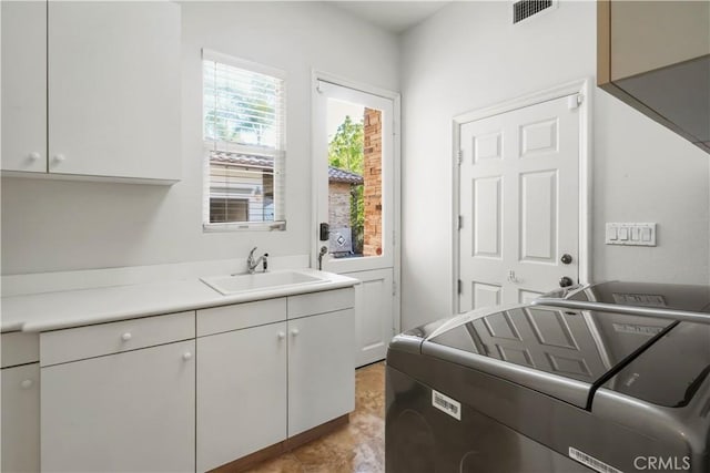 12165 Ojeda Ct, Tustin, CA 92782 - laundry room with separate washer and dryer and cabinet space