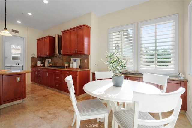 12165 Ojeda Ct, Tustin, CA 92782 - dining room featuring plenty of natural light, recessed lighting, and light tile patterned floors