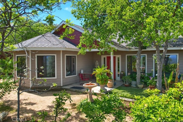 42625 Red Top Mountain Ct, Coarsegold, CA 93614 - rear view of house featuring a patio and roof with shingles