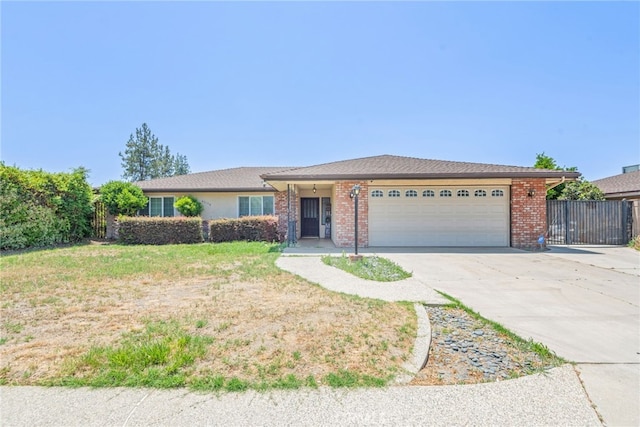 42159 Mayberry Ave, Hemet, CA 92544 - ranch-style house with an attached garage and driveway
