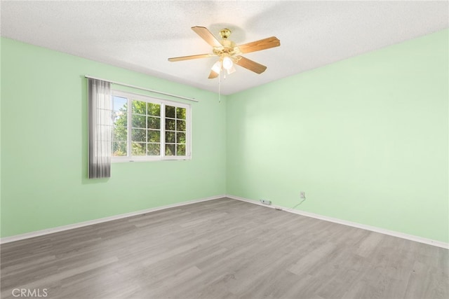 42159 Mayberry Ave, Hemet, CA 92544 - empty room featuring wood finished floors and a ceiling fan