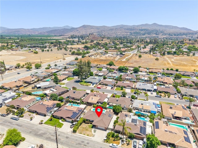 42159 Mayberry Ave, Hemet, CA 92544 - aerial overview of property's location featuring a mountainous background and nearby suburban area
