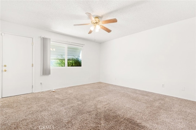 42159 Mayberry Ave, Hemet, CA 92544 - spare room featuring carpet, a ceiling fan, and a textured ceiling