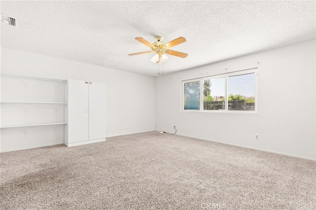 42159 Mayberry Ave, Hemet, CA 92544 - unfurnished room with ceiling fan, light colored carpet, and a textured ceiling