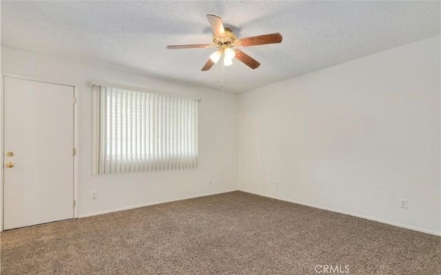 42159 Mayberry Ave, Hemet, CA 92544 - unfurnished room with carpet, a ceiling fan, and a textured ceiling