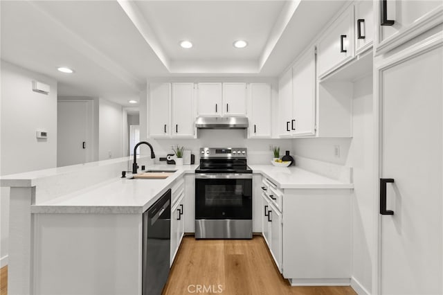 2733 Pine Creek Cir, Fullerton, CA 92835 - kitchen featuring stainless steel electric range, a sink, dishwasher, under cabinet range hood, and a peninsula