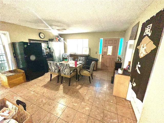 17406 Renault St, La Puente, CA 91744 - dining room with a textured ceiling and light tile patterned floors