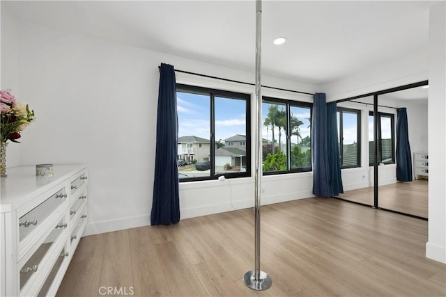 3550 Goldenrod Cir, Seal Beach, CA 90740 - unfurnished bedroom featuring light wood-style floors, baseboards, and recessed lighting