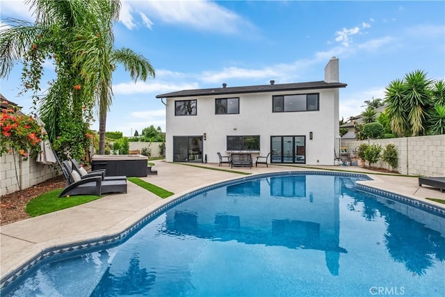 3550 Goldenrod Cir, Seal Beach, CA 90740 - view of pool featuring a hot tub, a patio, and a fenced backyard
