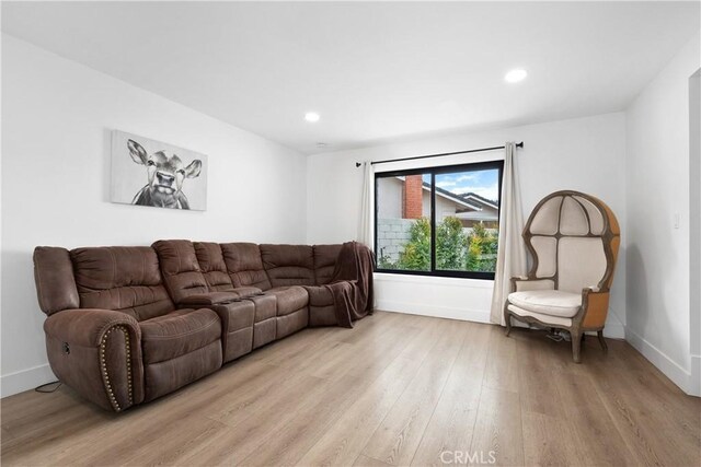 3550 Goldenrod Cir, Seal Beach, CA 90740 - living area with baseboards, light wood-style flooring, and recessed lighting